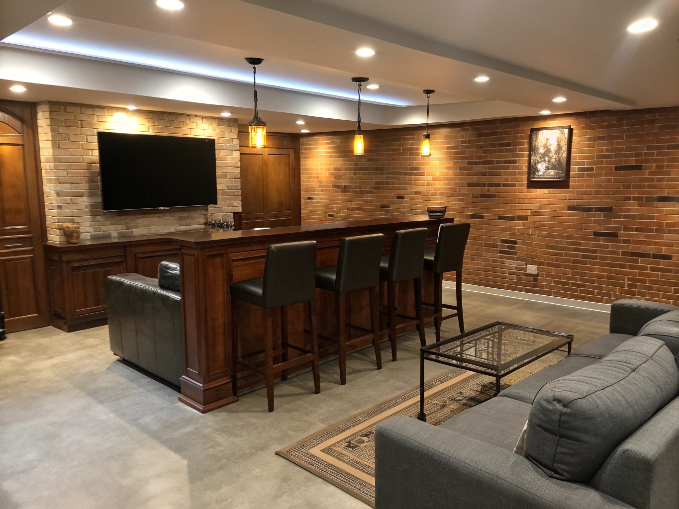 Custom walk-out basement wet bar with quartz counters, open timber shelving, and beverage center