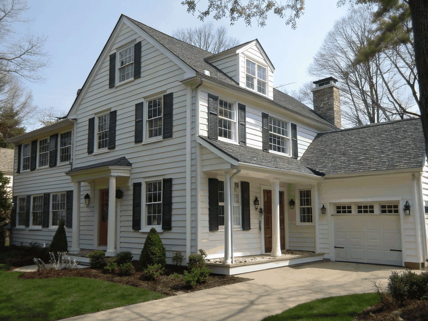 Two-story residential home addition tie-in during exterior finish phase