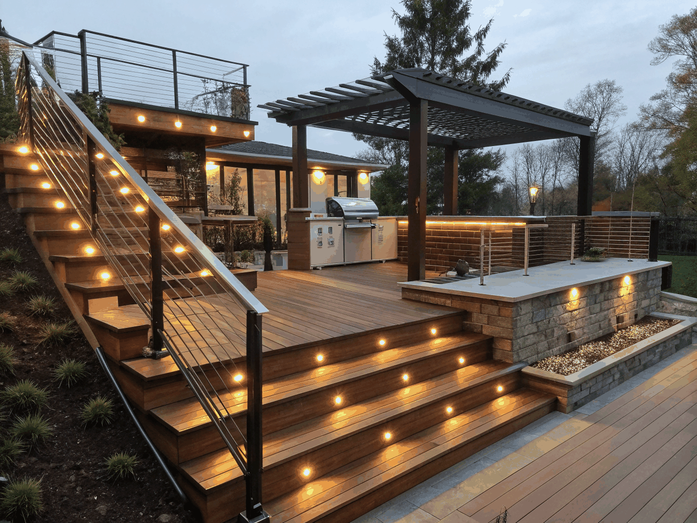 Custom composite deck with multi-level seating and built-in railings in Brookhaven