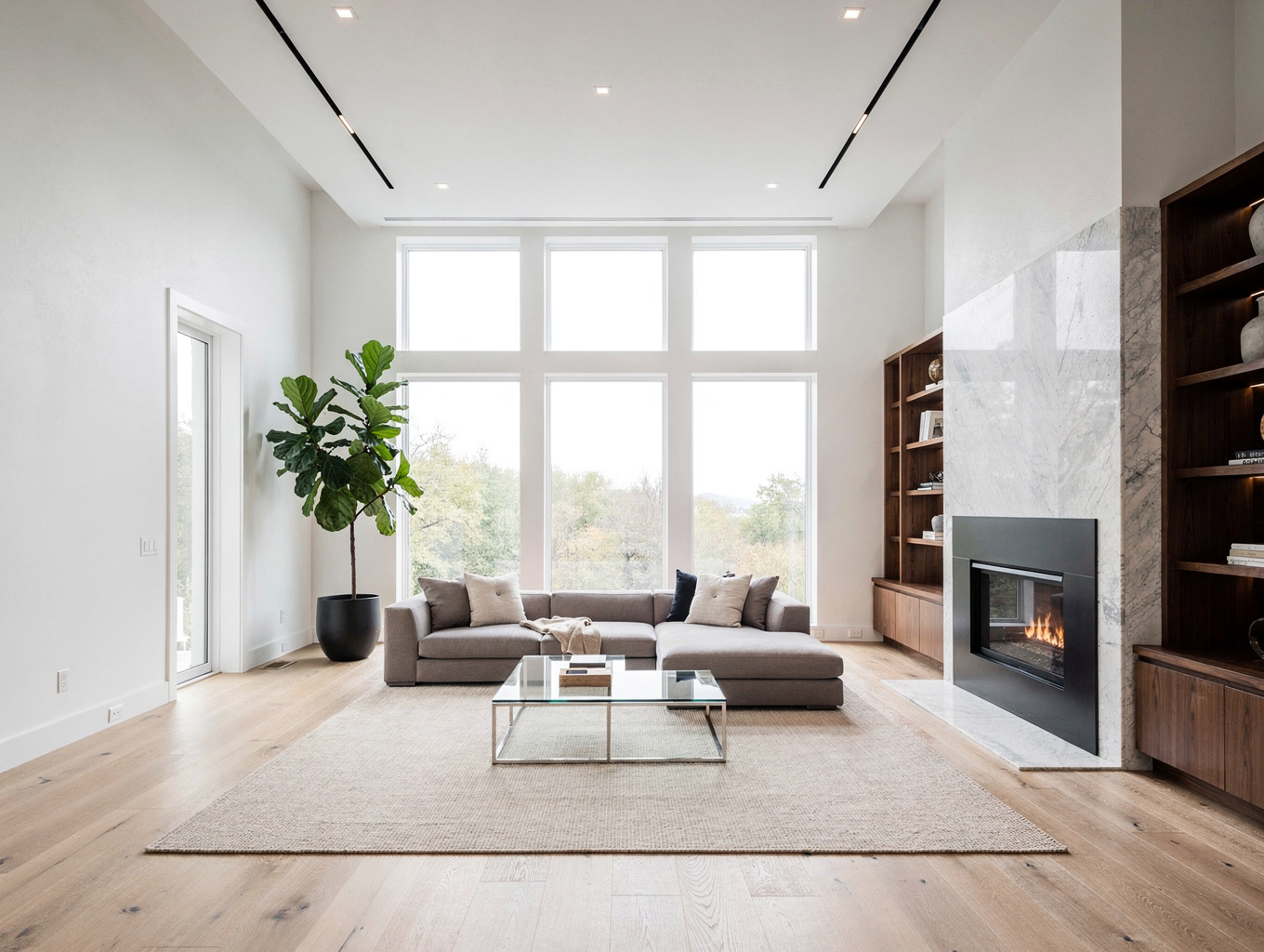 Open floor plan whole-home renovation with hardwood floors and architectural trim