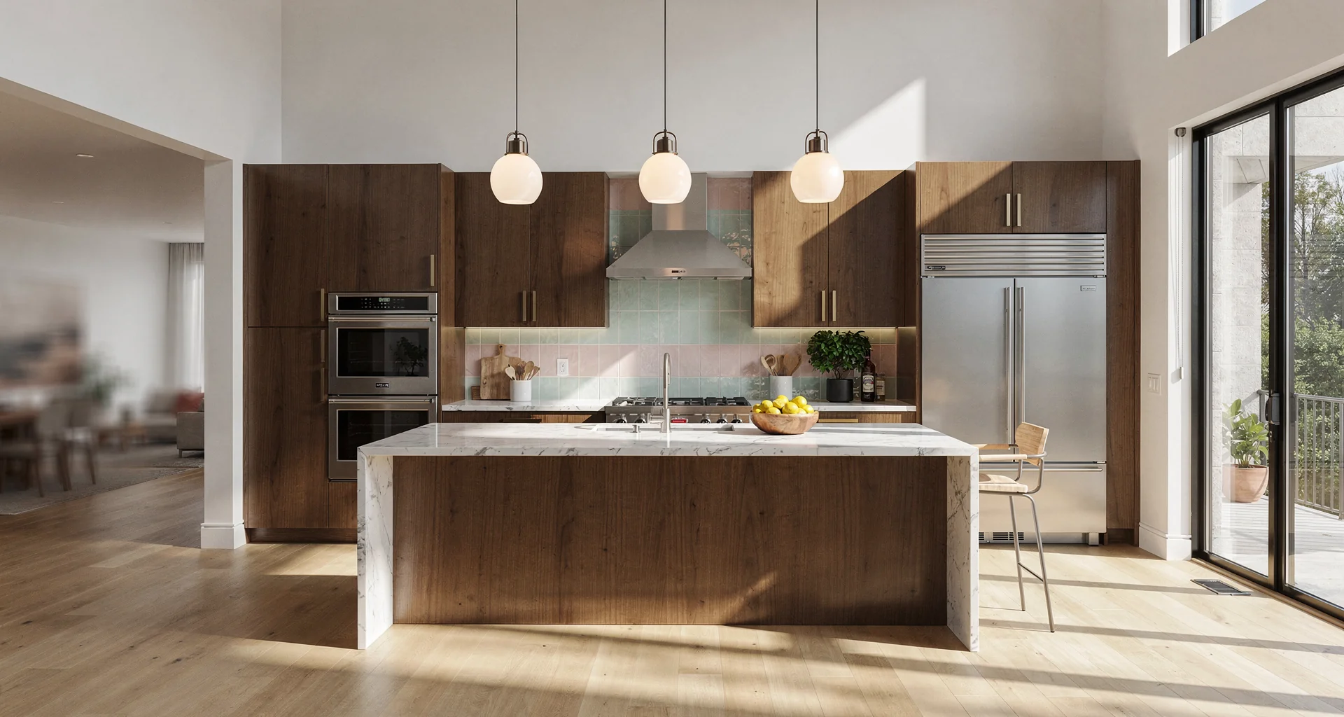 Modern kitchen renovation featuring custom shaker cabinetry, marble countertops, and warm recessed pendant lighting
