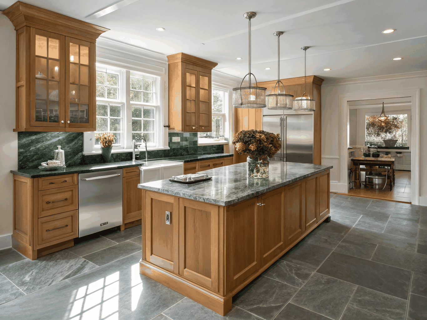 Custom Brookhaven kitchen renovation showing marble island and bespoke cabinets