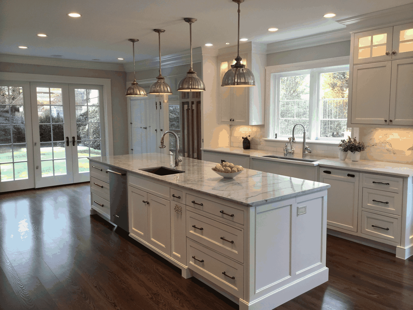 Custom residential kitchen remodeling with high-end cabinetry and island