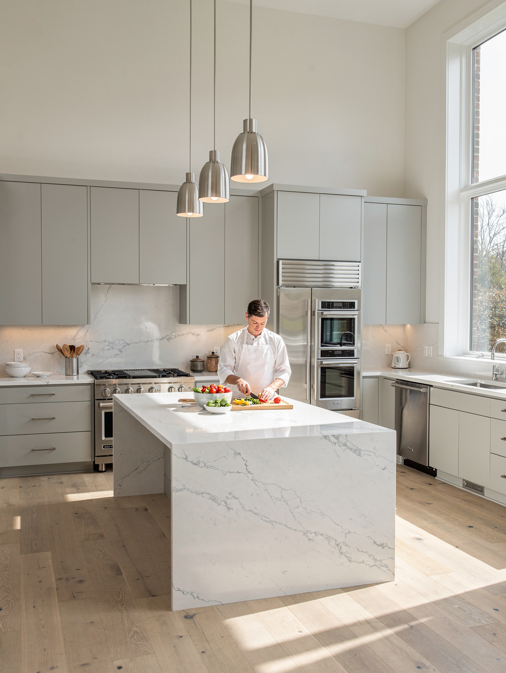 Custom kitchen cabinetry and marble counter installation as part of a residential remodel