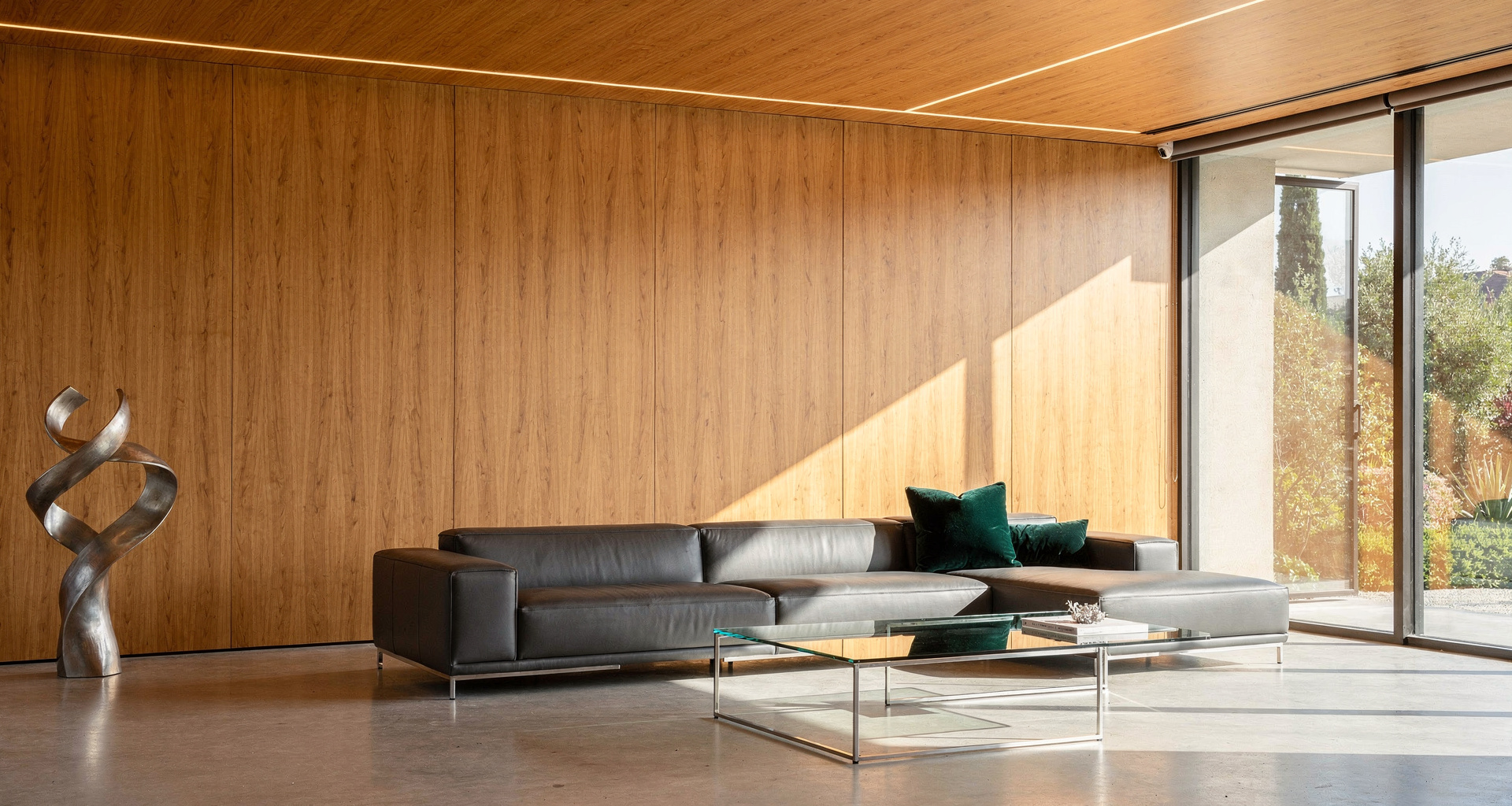 Completed whole-home renovation displaying seamless wood flooring, upgraded electrical, and custom wall openings